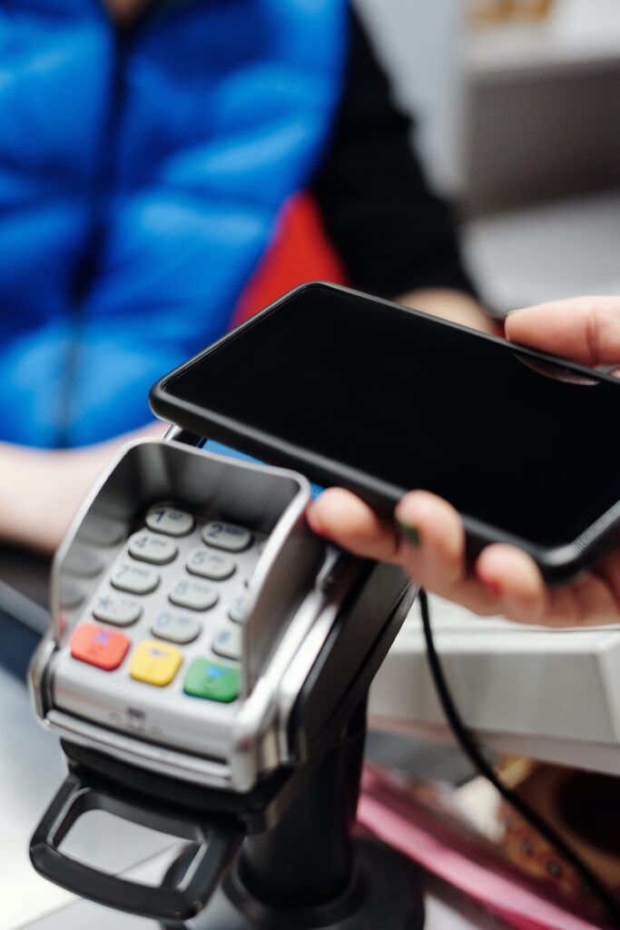 Close-up of a phone and credit card machine